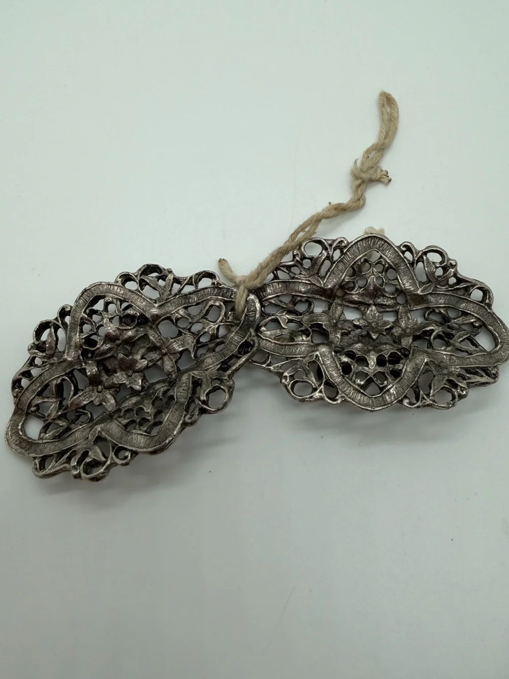 Vintage silver tone molded floral shoe clips